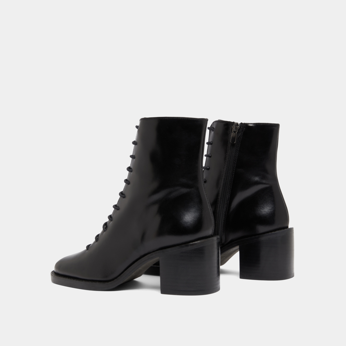 Boots à lacets et talons débordants in black leather | BRINDILLE