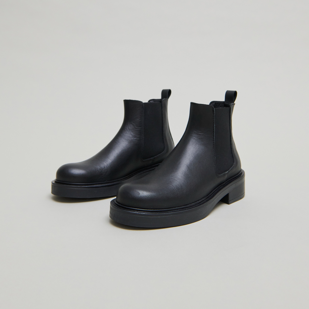 Boots à élastiques in black leather | MELANIE