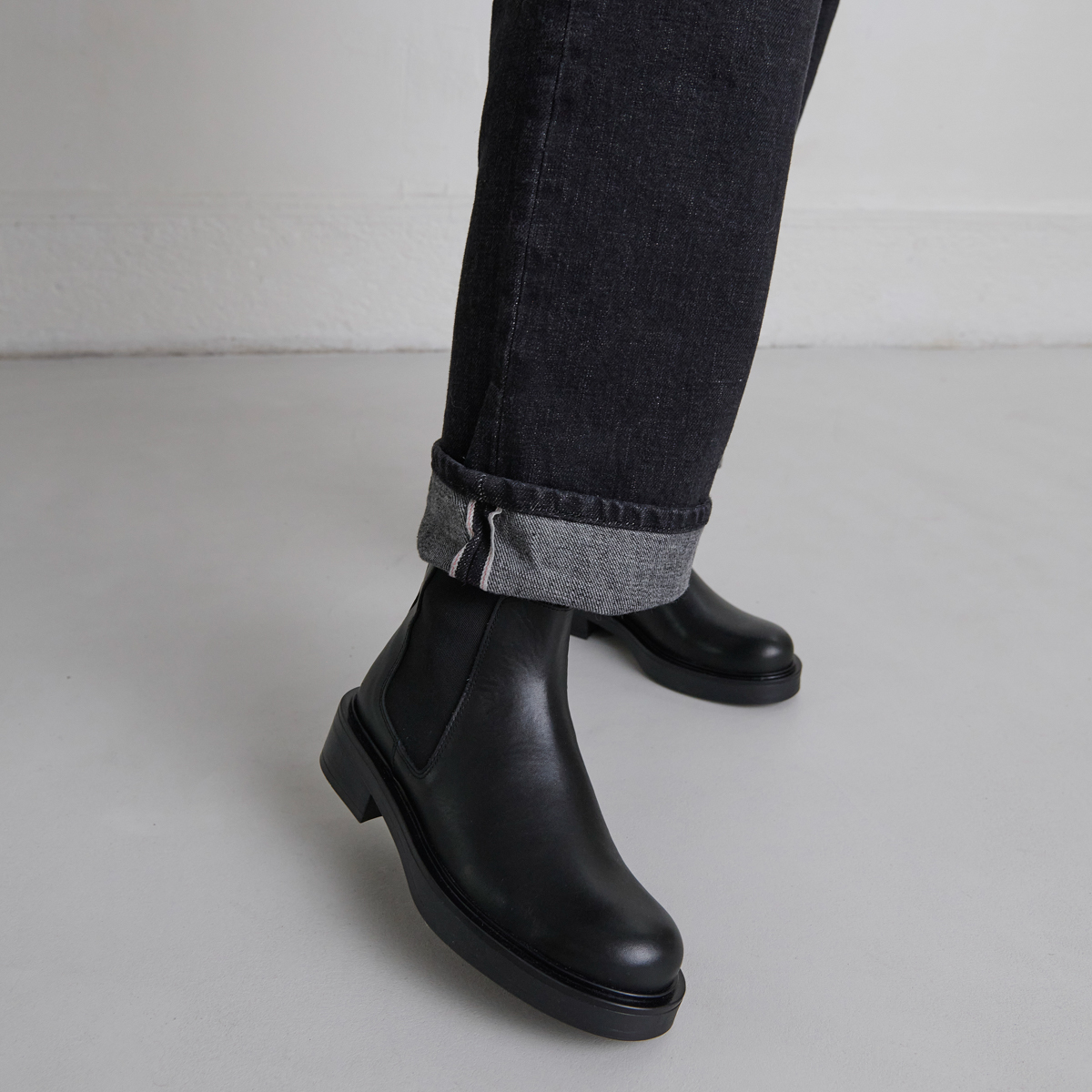 Boots à élastiques in black leather | MELANIE