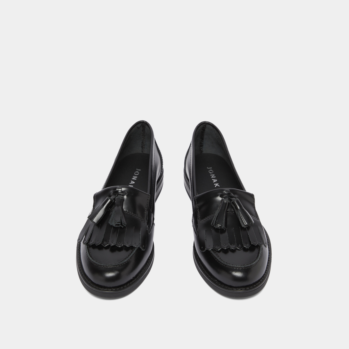 Mocassins à glands in black glazed leather | NELLE