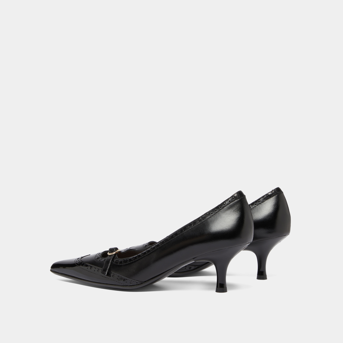 Escarpins à brides et détails perforés..... in black patent and black leather | DALTA