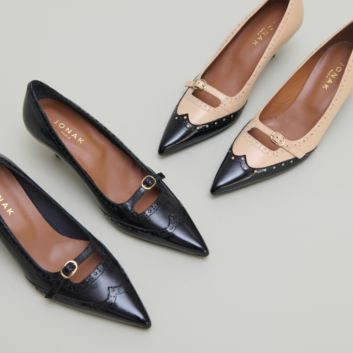 Escarpins à brides et détails perforés..... in black patent and black leather | DALTA