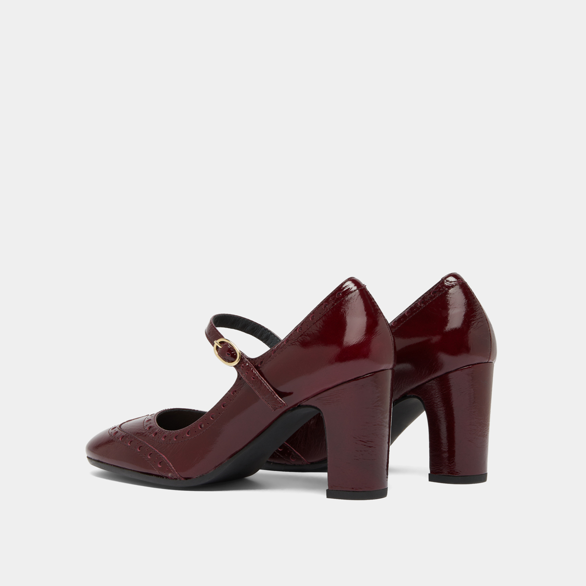 Babies à talons et détails perforés in burgundy shiny leather | DIRIOS