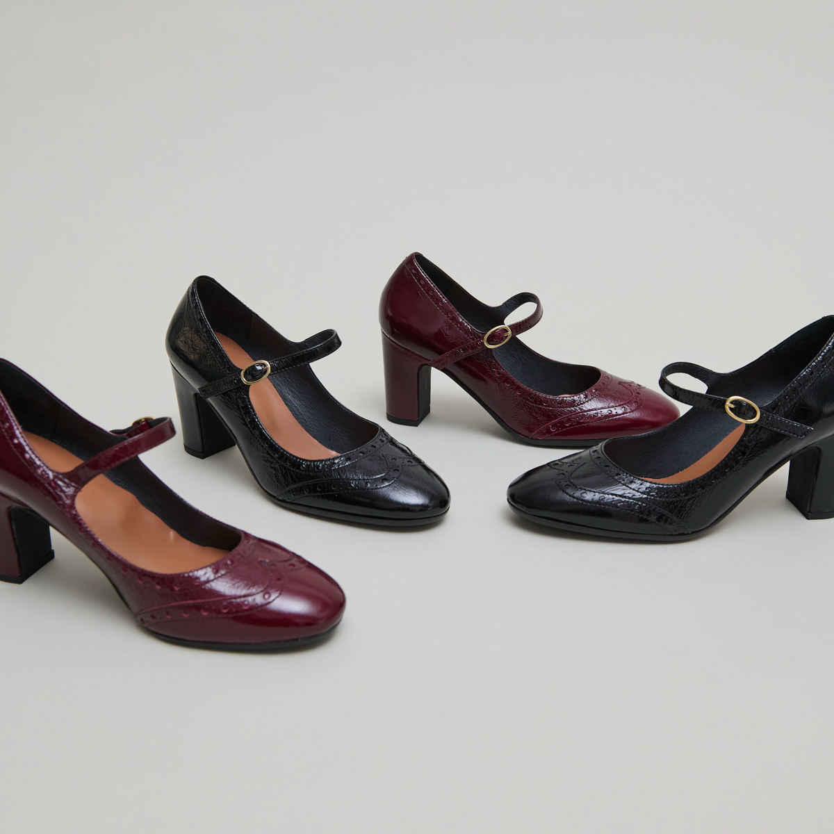 Babies à talons et détails perforés in burgundy shiny leather | DIRIOS