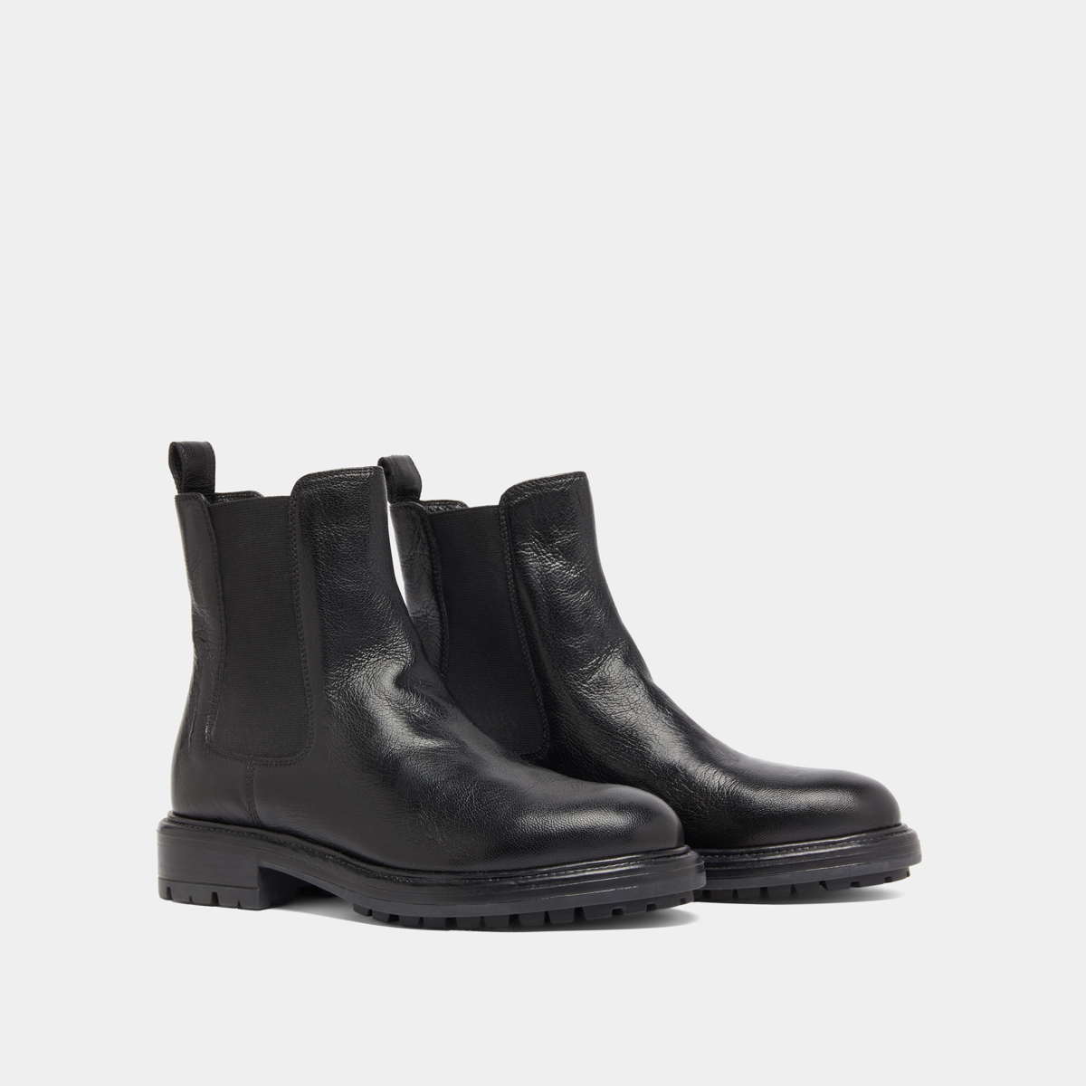 Lowboots with elastic straps and notched soles in black grained leather | CELINA
