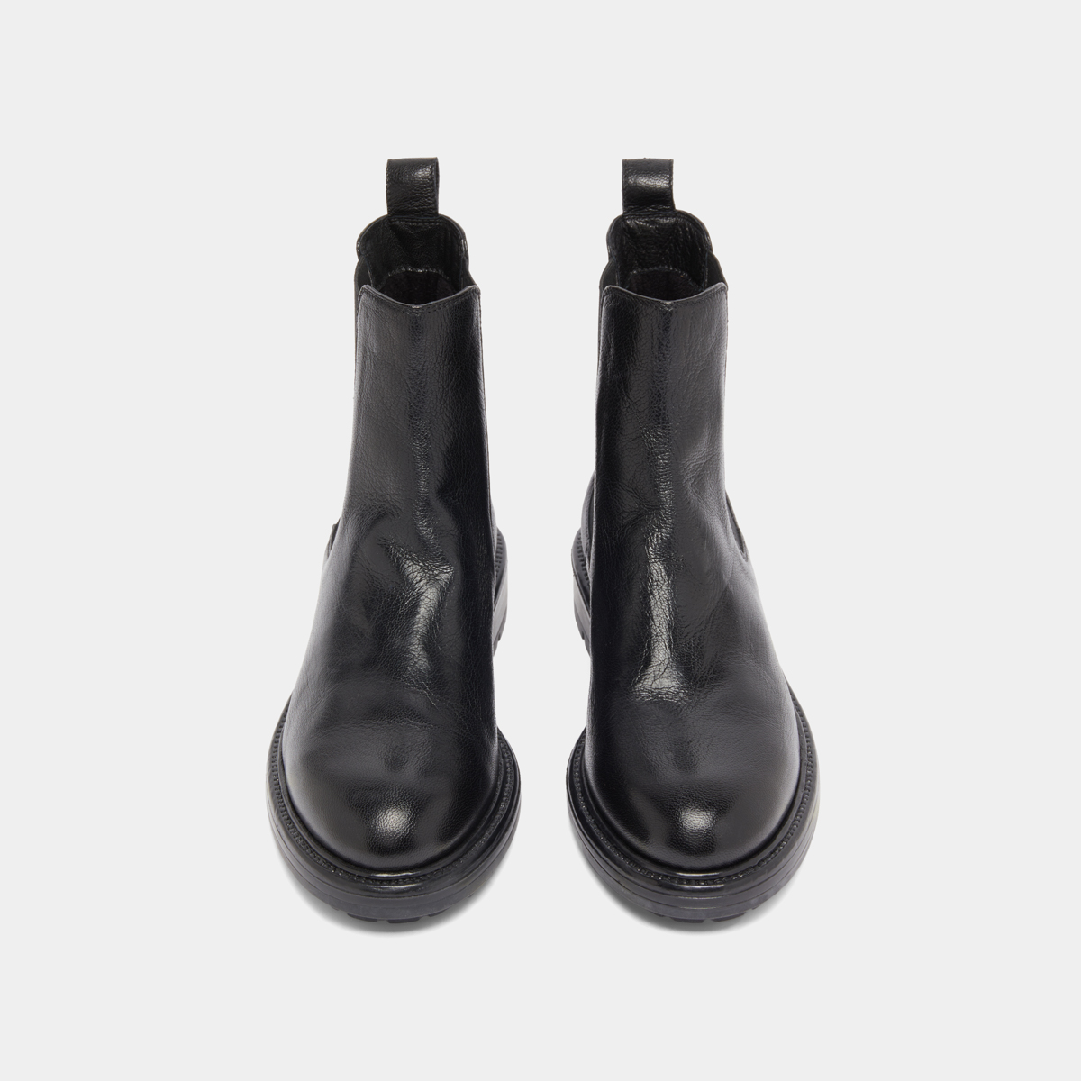 Lowboots with elastic straps and notched soles in black grained leather | CELINA