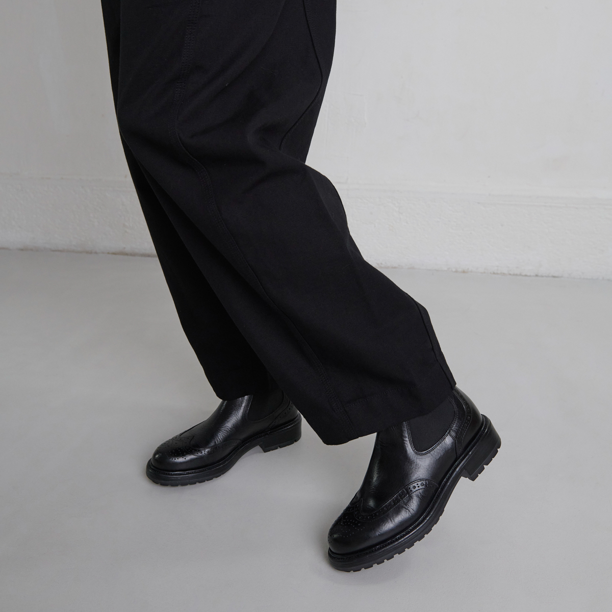 Boots à semelles crantées in black leather | CELIA