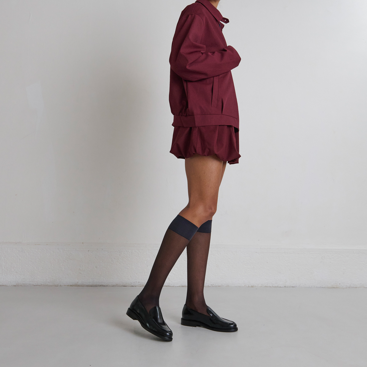 Mocassins à bouts ronds in black glazed leather | DIRNO