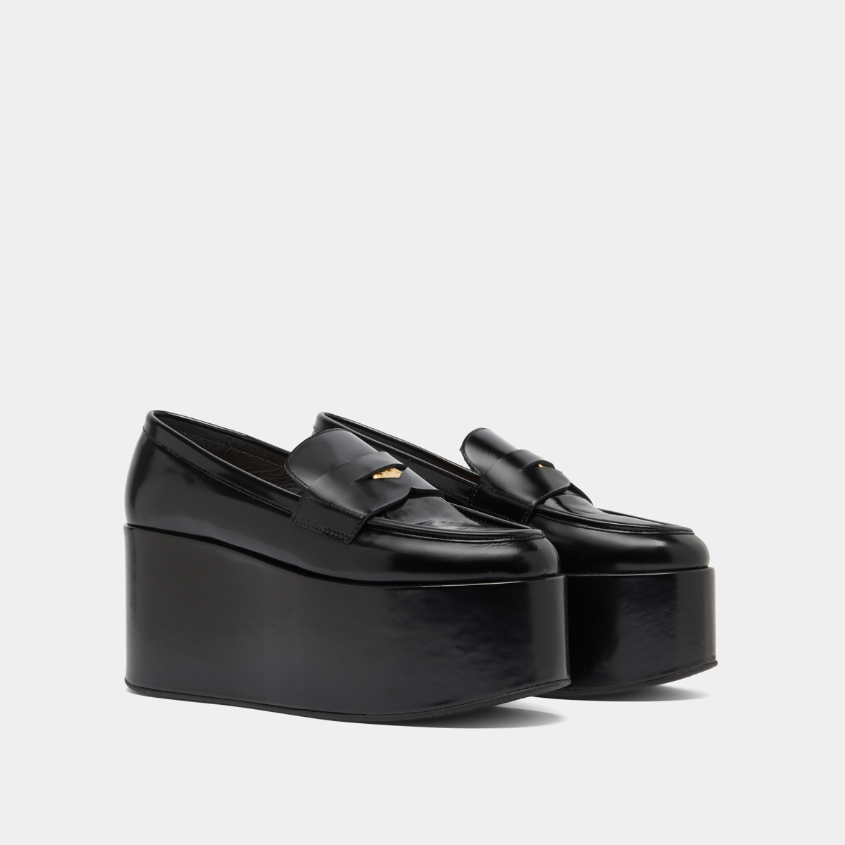 Mocassins à plateformes in black glazed leather | DOPO