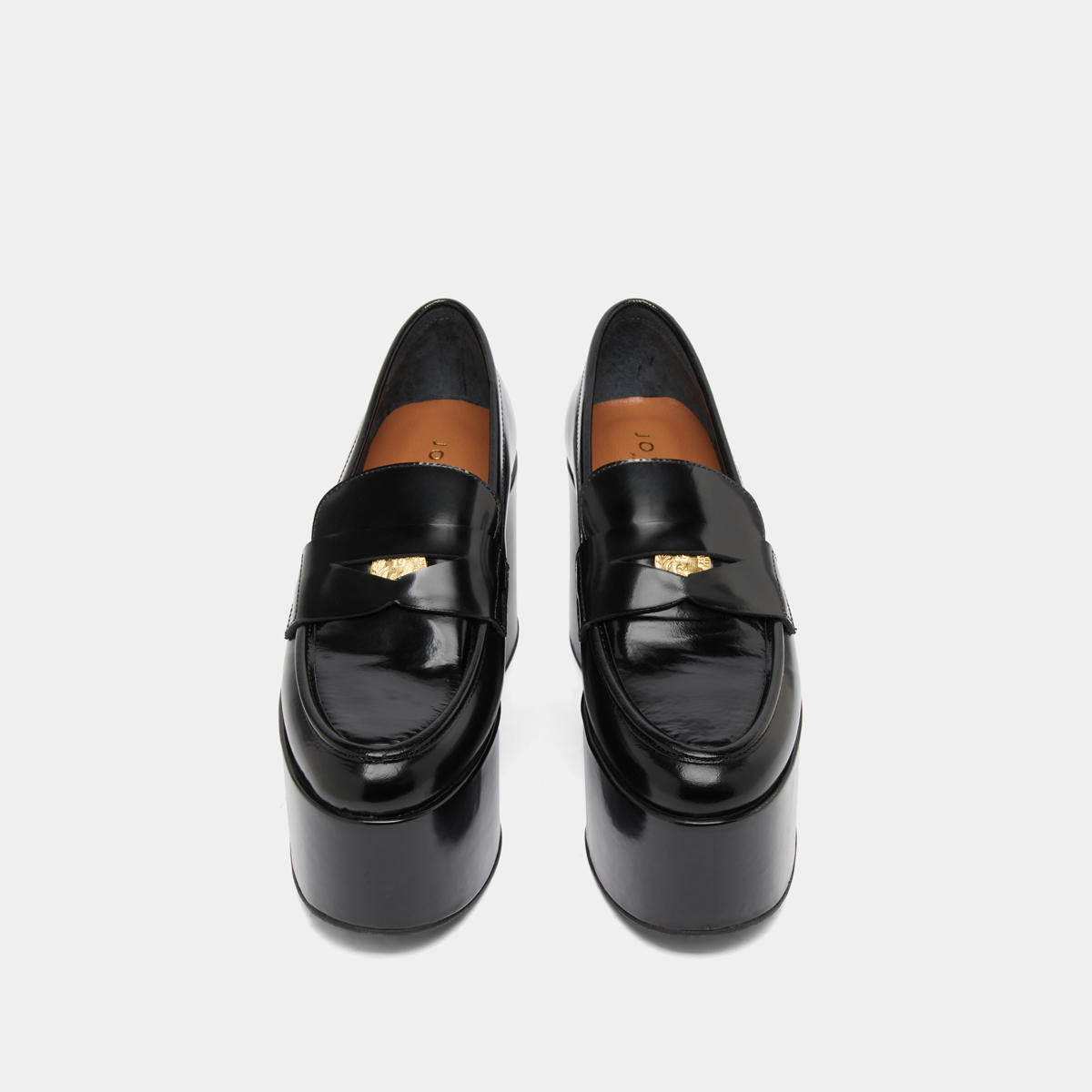 Mocassins à plateformes in black glazed leather | DOPO