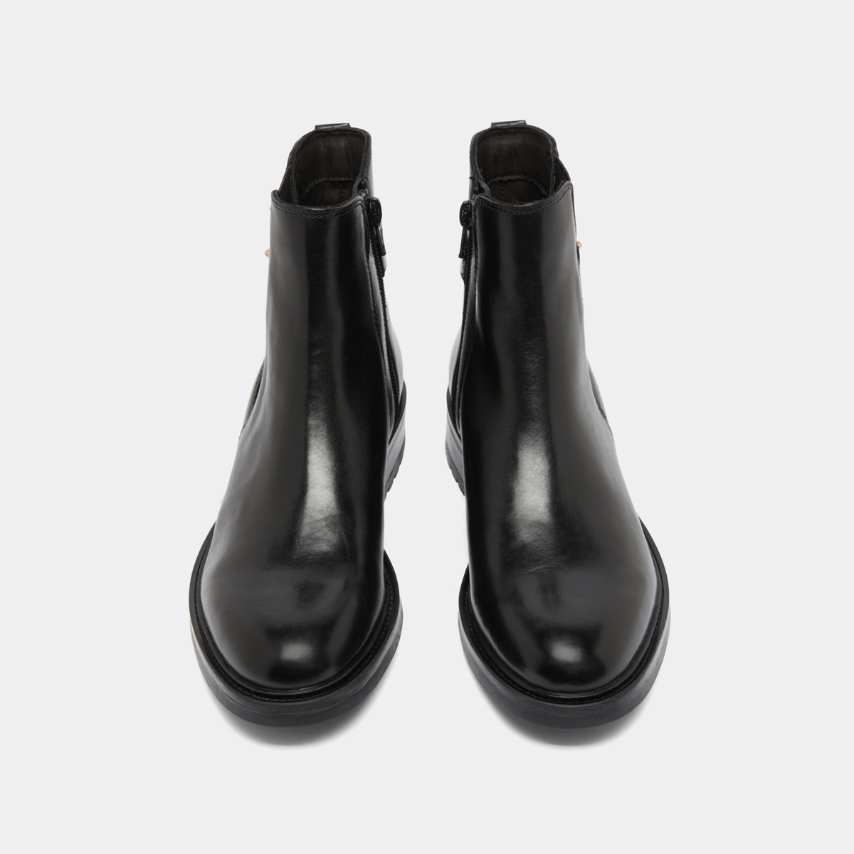 Boots basses à talons crantés in black leather | GABIN