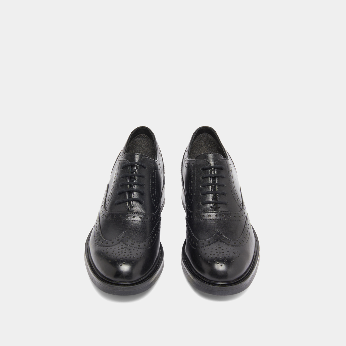Richelieus à détails ajourés in black leather | GAD