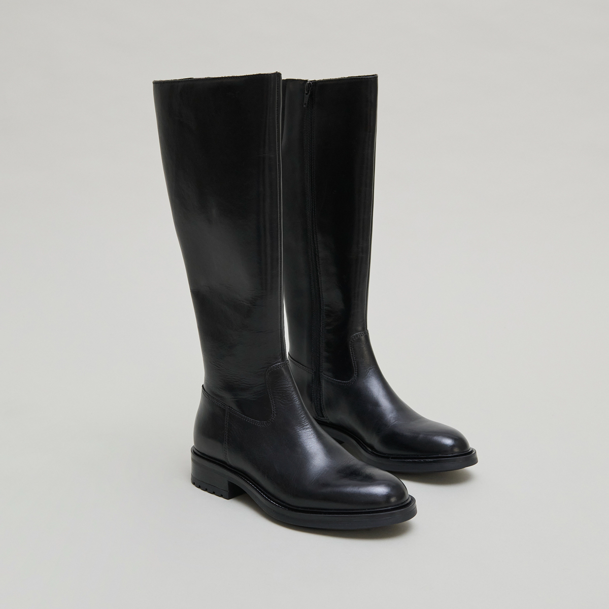 Bottes à talons crantés in black leather | GRACIANA