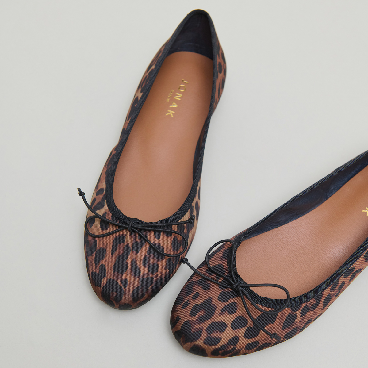 Ballerines à lacets in brown leopard textile | DELFINA