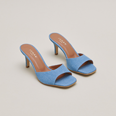 Heeled mules in blue denim | VERTIGO
