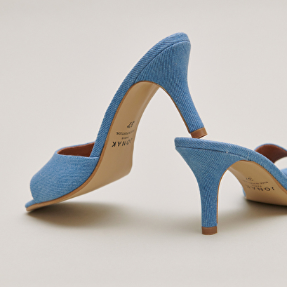 Heeled mules in blue denim | VERTIGO