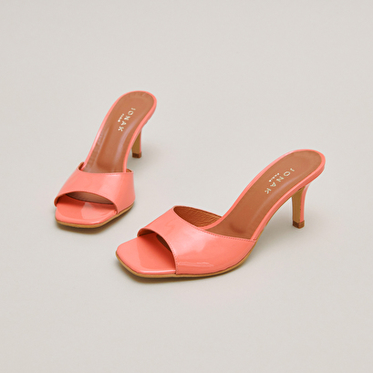 Heeled mules in coral patent | VERTIGO