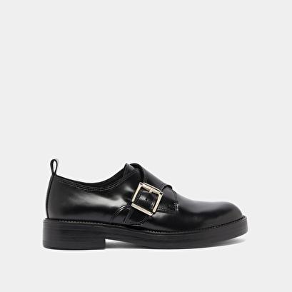 Derbies &agrave; boucles ajustables in black glazed leather | archibald