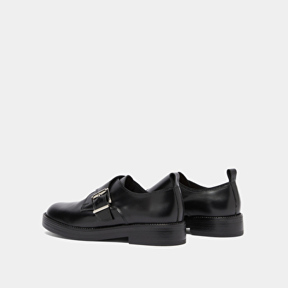 Derbies &agrave; boucles ajustables in black glazed leather | archibald