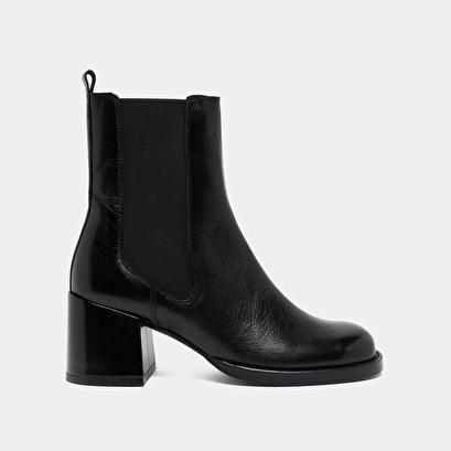 Boots &agrave; talons et &eacute;lastiques in black distressed leather | bienvue