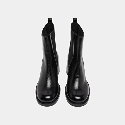 Boots &agrave; talons et &eacute;lastiques in black distressed leather | bienvue