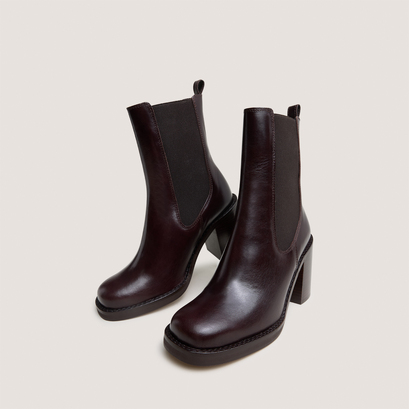 Ankle boots with overflowing heels in dark brown leather | bretz