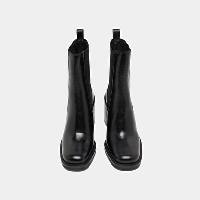 Ankle boots with overflowing heels in black leather | bretz