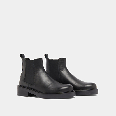 Boots &agrave; &eacute;lastiques in black leather | melanie