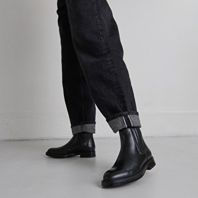Boots &agrave; fronces in black leather | cleandre