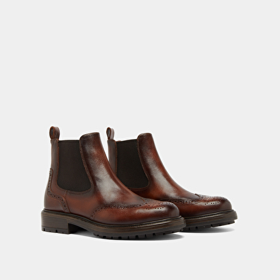 Boots &agrave; semelles crant&eacute;es in cognac patinated leather | celia