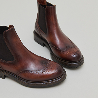 Boots &agrave; semelles crant&eacute;es in cognac patinated leather | celia