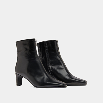 Bottines &agrave; talons et fermetures &eacute;clairs ... in black leather | danza