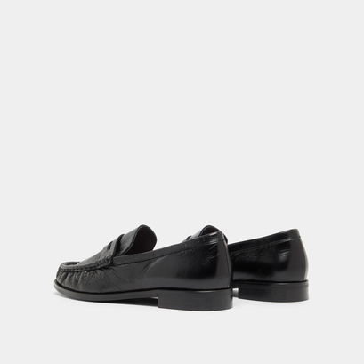 Round-toed loafers in black distressed leather | delice