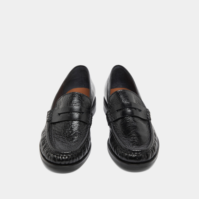 Round-toed loafers in black distressed leather | delice