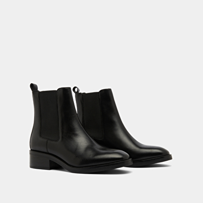Boots &agrave; &eacute;lastiques in black leather | gabrielle