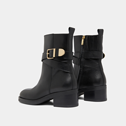 Bottines &agrave; boucles in black leather | ima