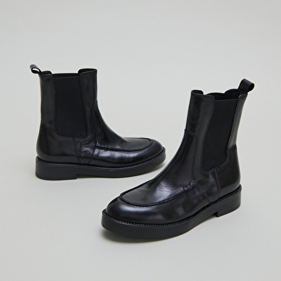 Boots &agrave; &eacute;lastiques larges in black leather | allan