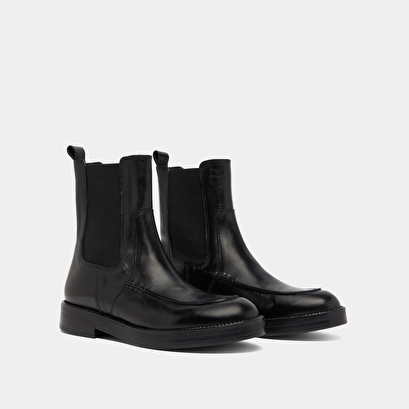 Boots &agrave; &eacute;lastiques larges in black leather | allan