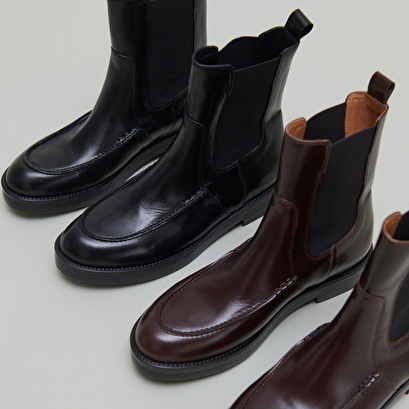 Boots &agrave; &eacute;lastiques larges in black leather | allan