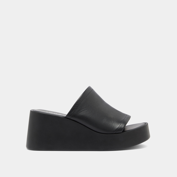 Wedge mules in black leather | EUGENE