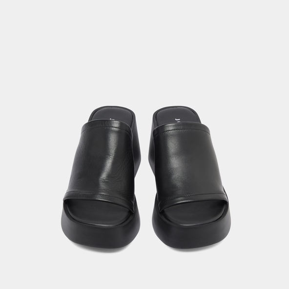 Wedge mules in black leather | EUGENE