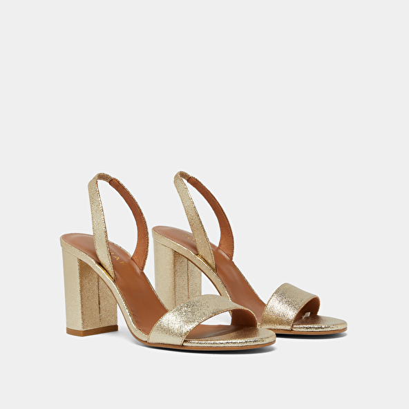 Heeled sandals in platinum metallic textile | DIDUS