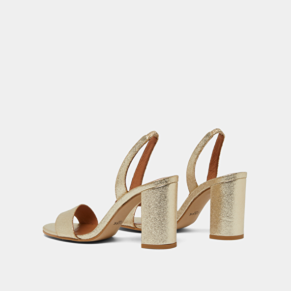 Heeled sandals in platinum metallic textile | DIDUS