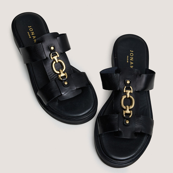 Mules with golden jaws in black leather | DOP
