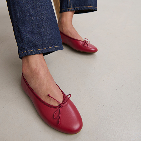 Ballet flats with laces in carmine red leather | DJERBA