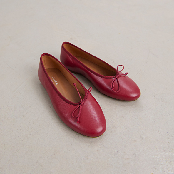 Ballet flats with laces in carmine red leather | DJERBA