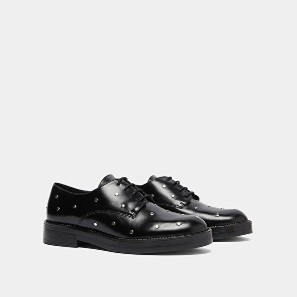 Derbies à détails argentés in black leather | ASTOU