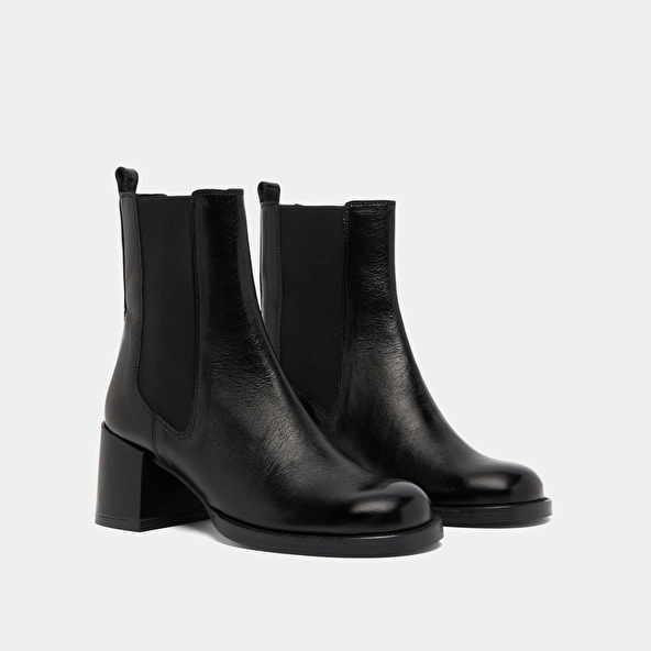 Boots à talons et élastiques in black distressed leather | BIENVUE