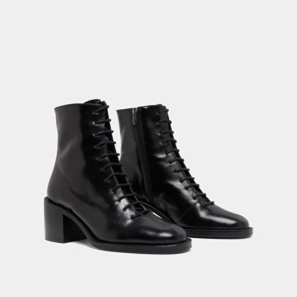Boots à lacets et talons débordants in black leather | BRINDILLE