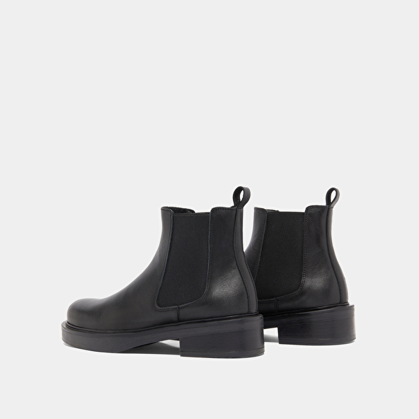 Boots à élastiques in black leather | MELANIE